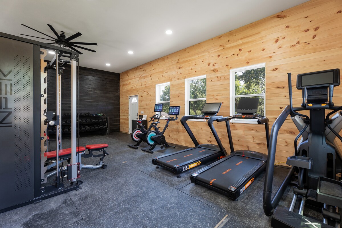 Full home gym with cardio and weight equipment